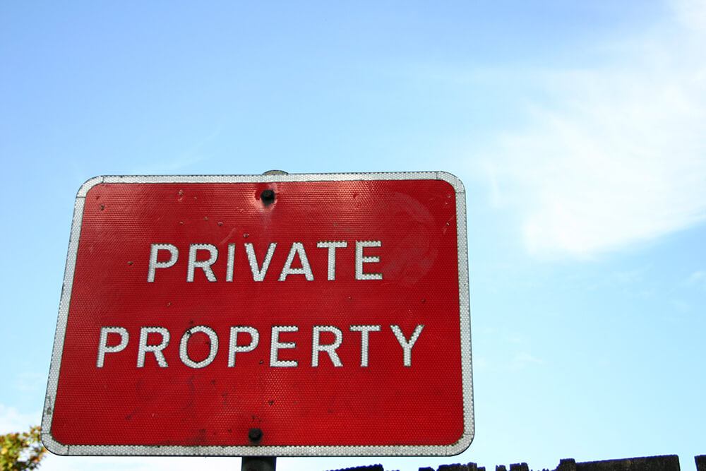 Red private property sign