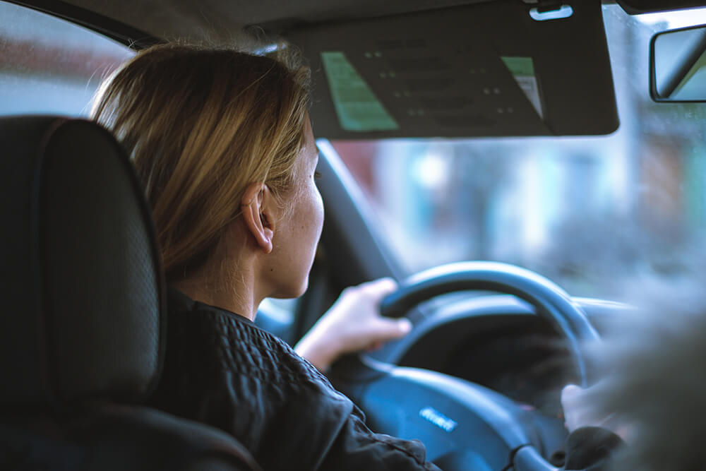 Woman driving car