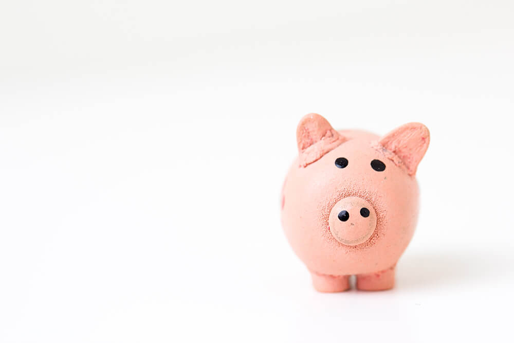 Piggy bank against white background