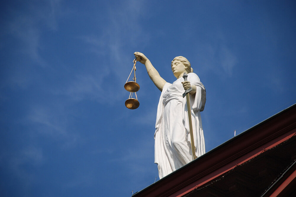 Justice statue with scales and sword